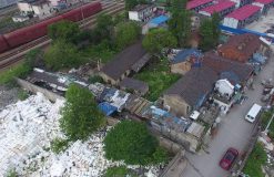 鐵路旁臟亂差的“城中村”終于消失了，這個鎮如何做到？