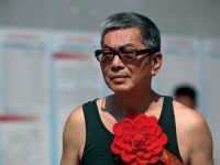 戴著大紅花告別蝸居生活，上海楊浦160舊改基地集中搬場