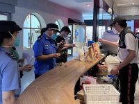 五角場商圈開展防疫地毯式巡查，每天200人行走在商鋪和社區